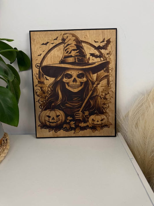 Unique wood-burned artwork to set the perfect spooky vibe