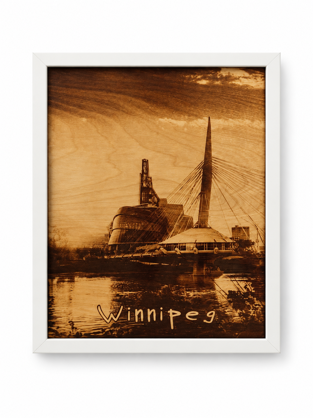 🌉 Winnipeg Skyline – Burned Wood Wall Art in a white frame on a white studio background